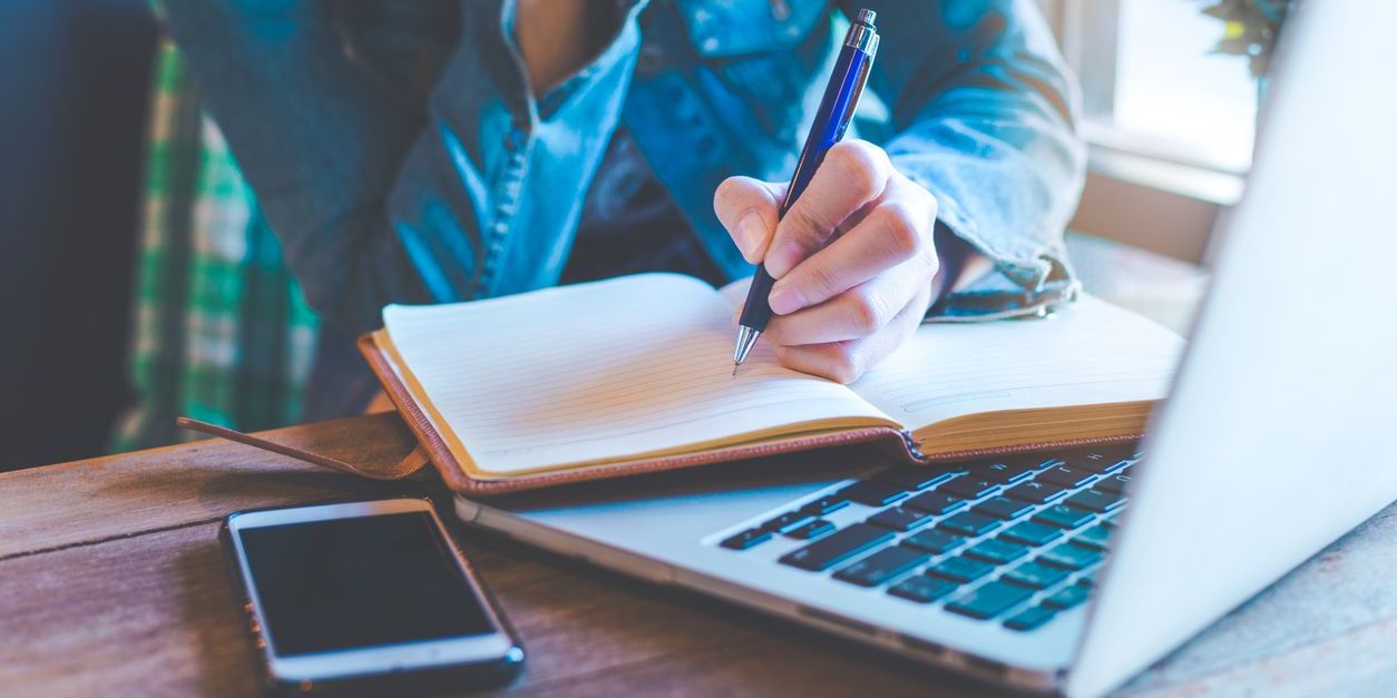 An author starting to put thoughts down on paper.