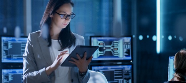 An information security analyst on her tablet.