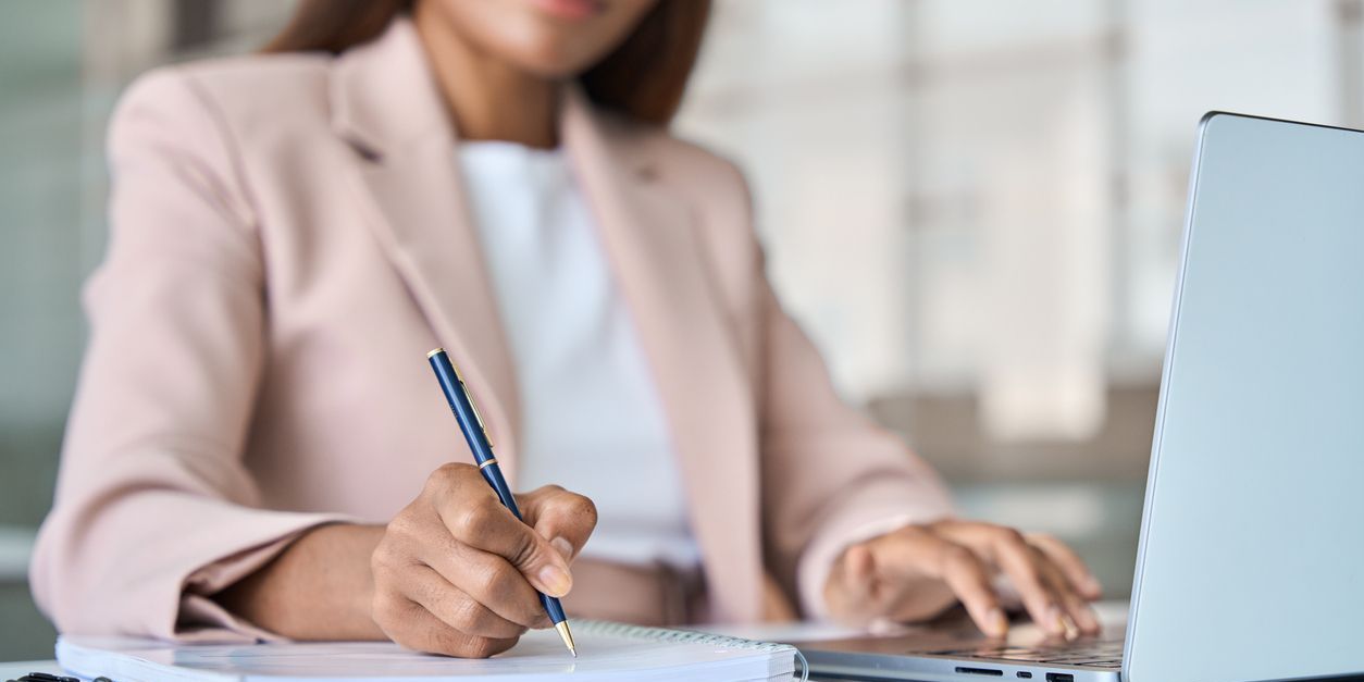 A feature writer writing an article.