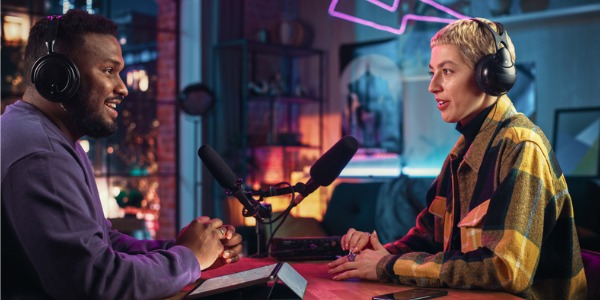 A podcast host interviewing his guest.