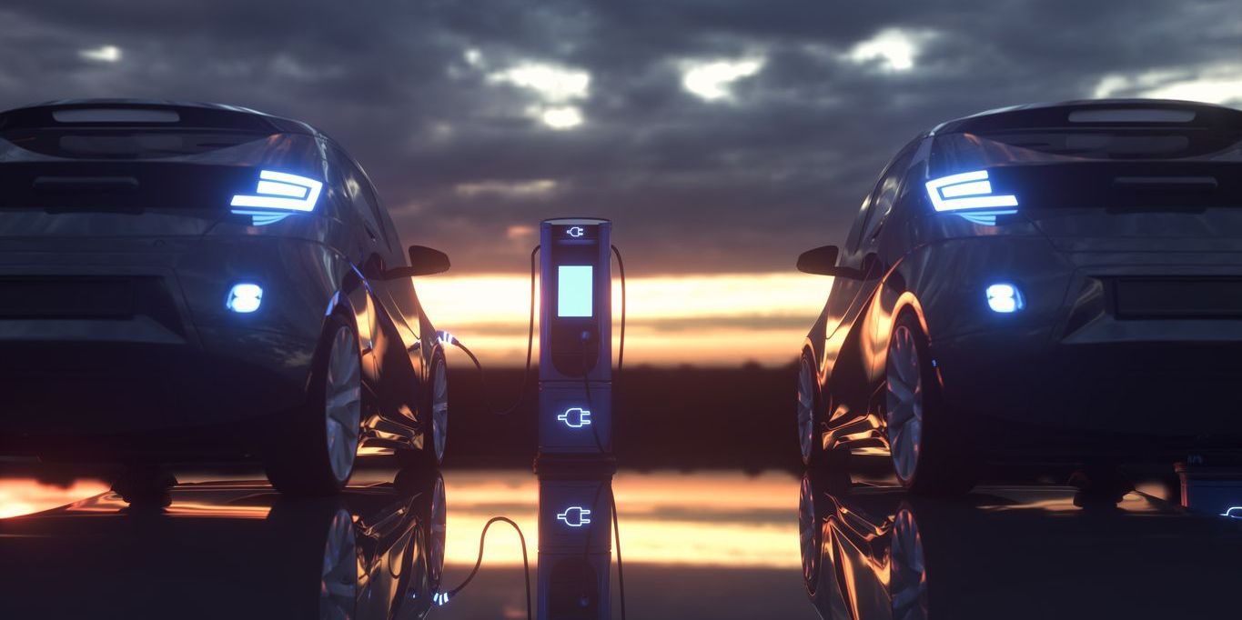 Electric cars charging at a charging station.