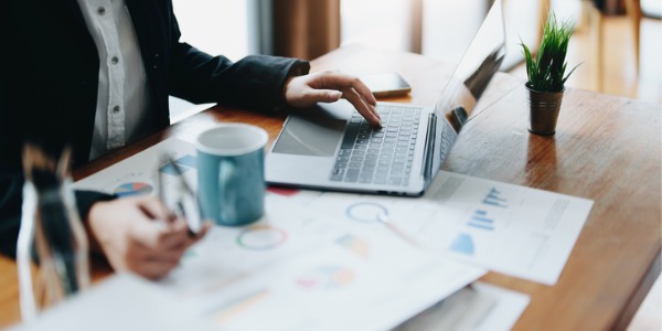 A private wealth manager conducting analysis to identify new investments.